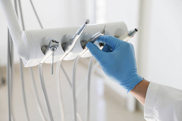 Professional Invisalign Clear Aligners technician working in Downers Grove, IL